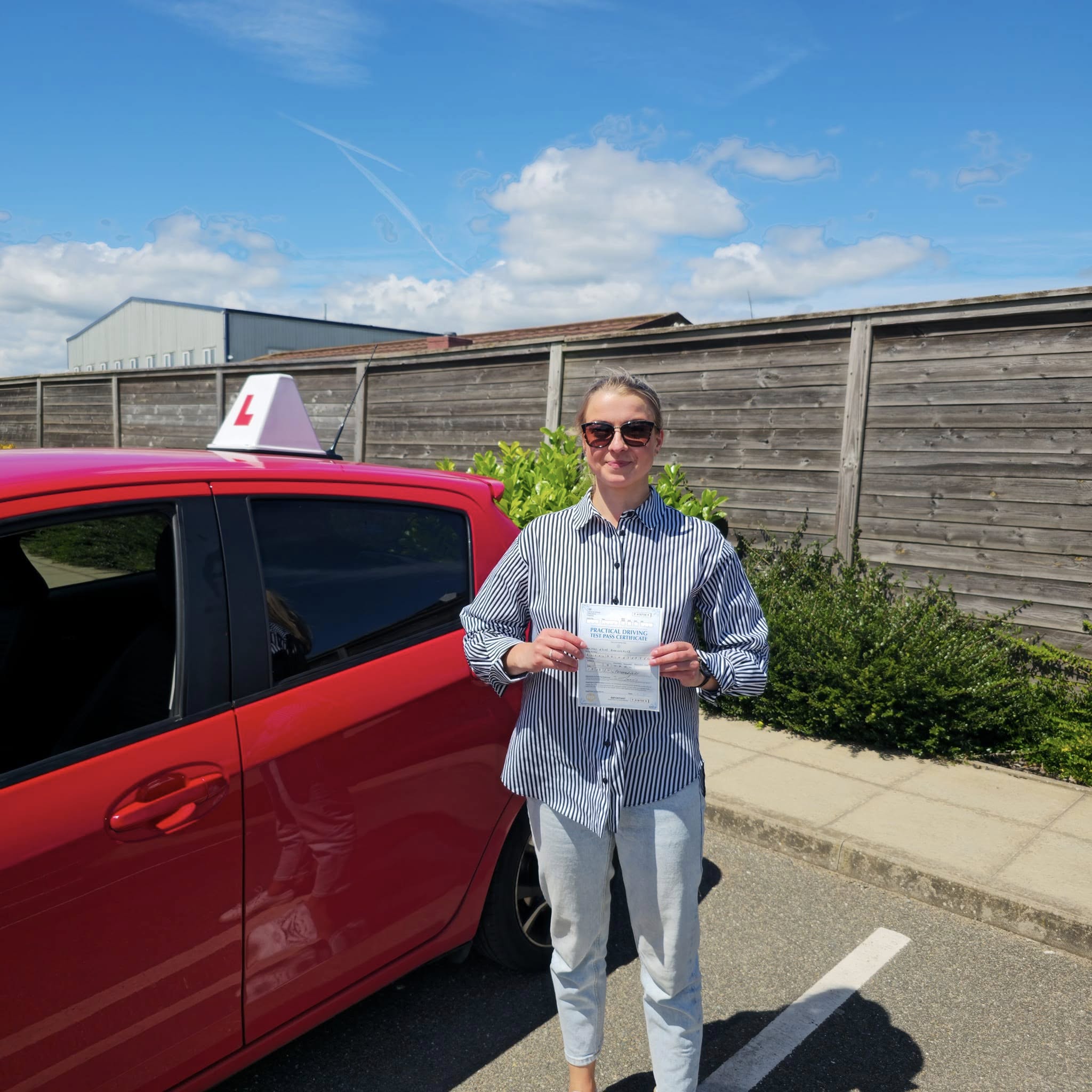 MSA Driving School pupil holding their pass certificate