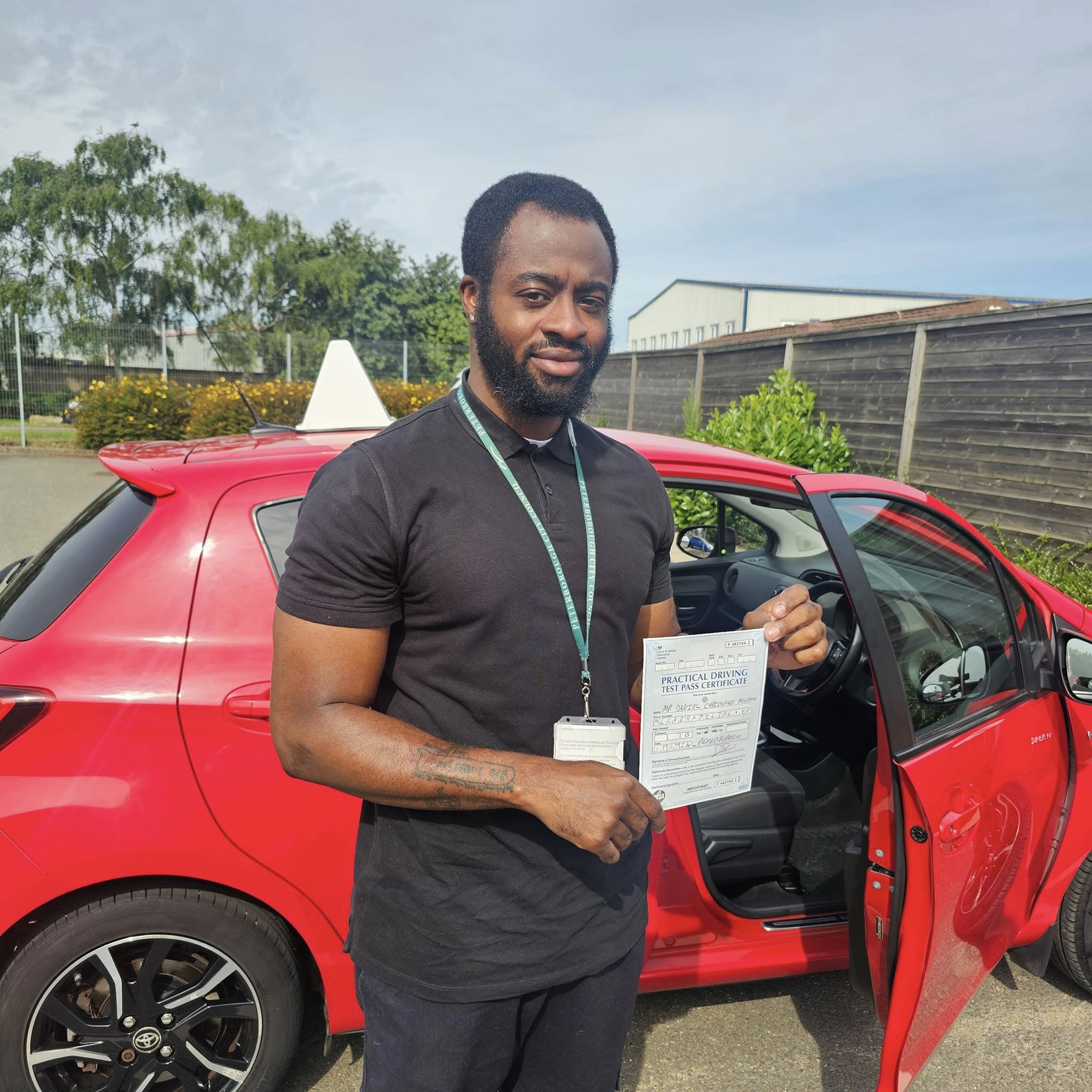 MSA Driving School pupil holding their pass certificate