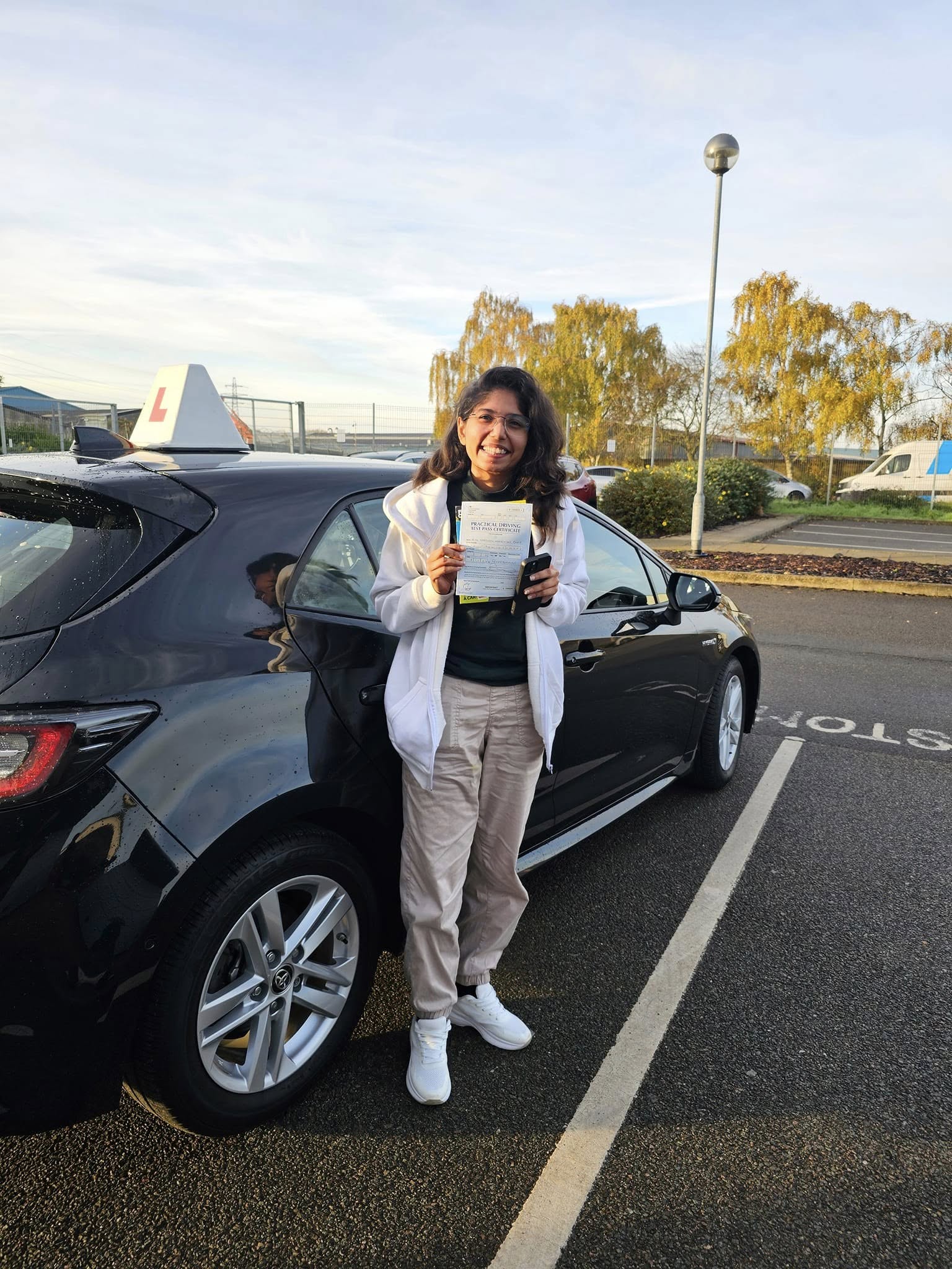 MSA Driving School pupil holding their pass certificate