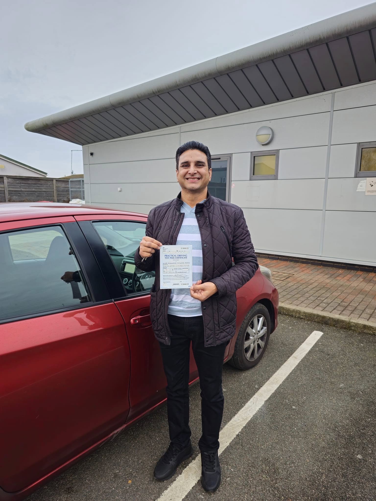 MSA Driving School pupil holding their pass certificate
