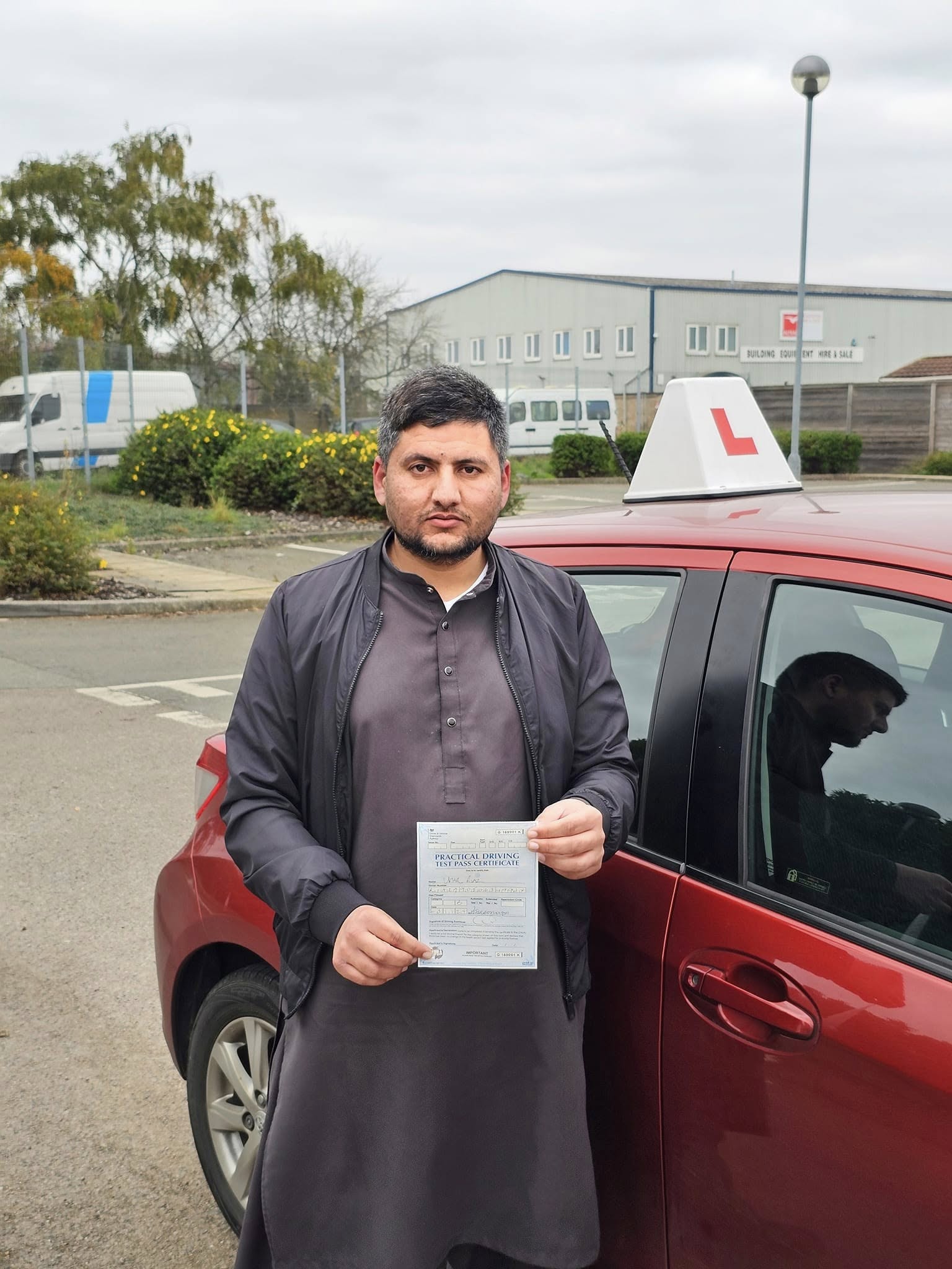 MSA Driving School pupil holding their pass certificate