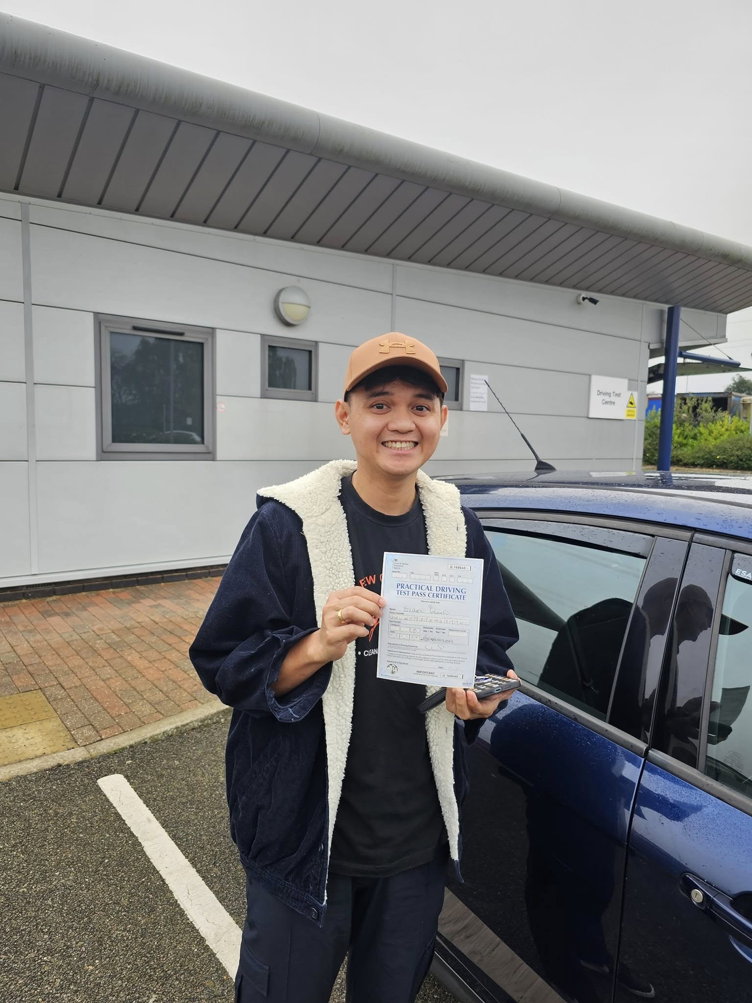 MSA Driving School pupil holding their pass certificate