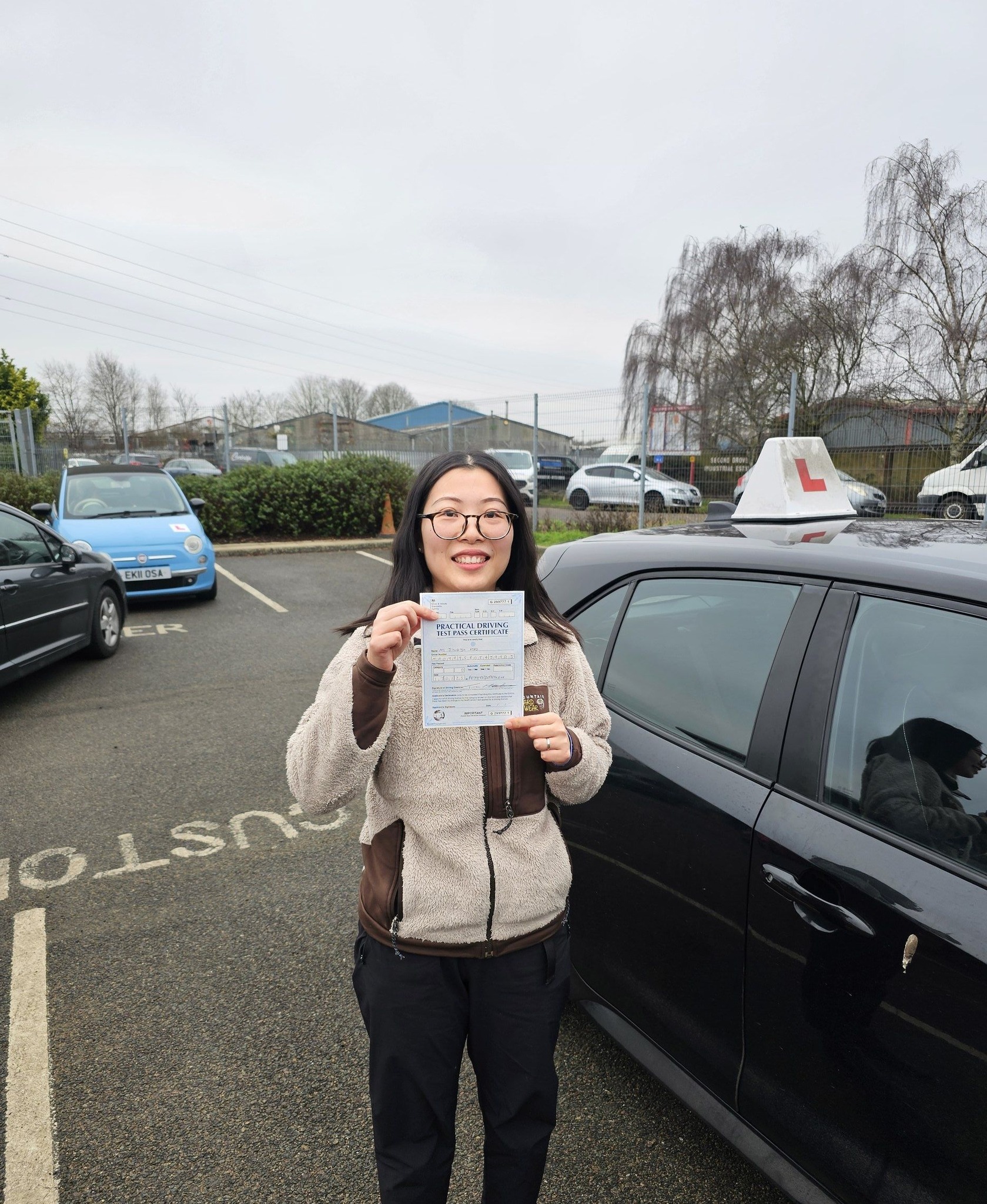 MSA Driving School pupil holding their pass certificate