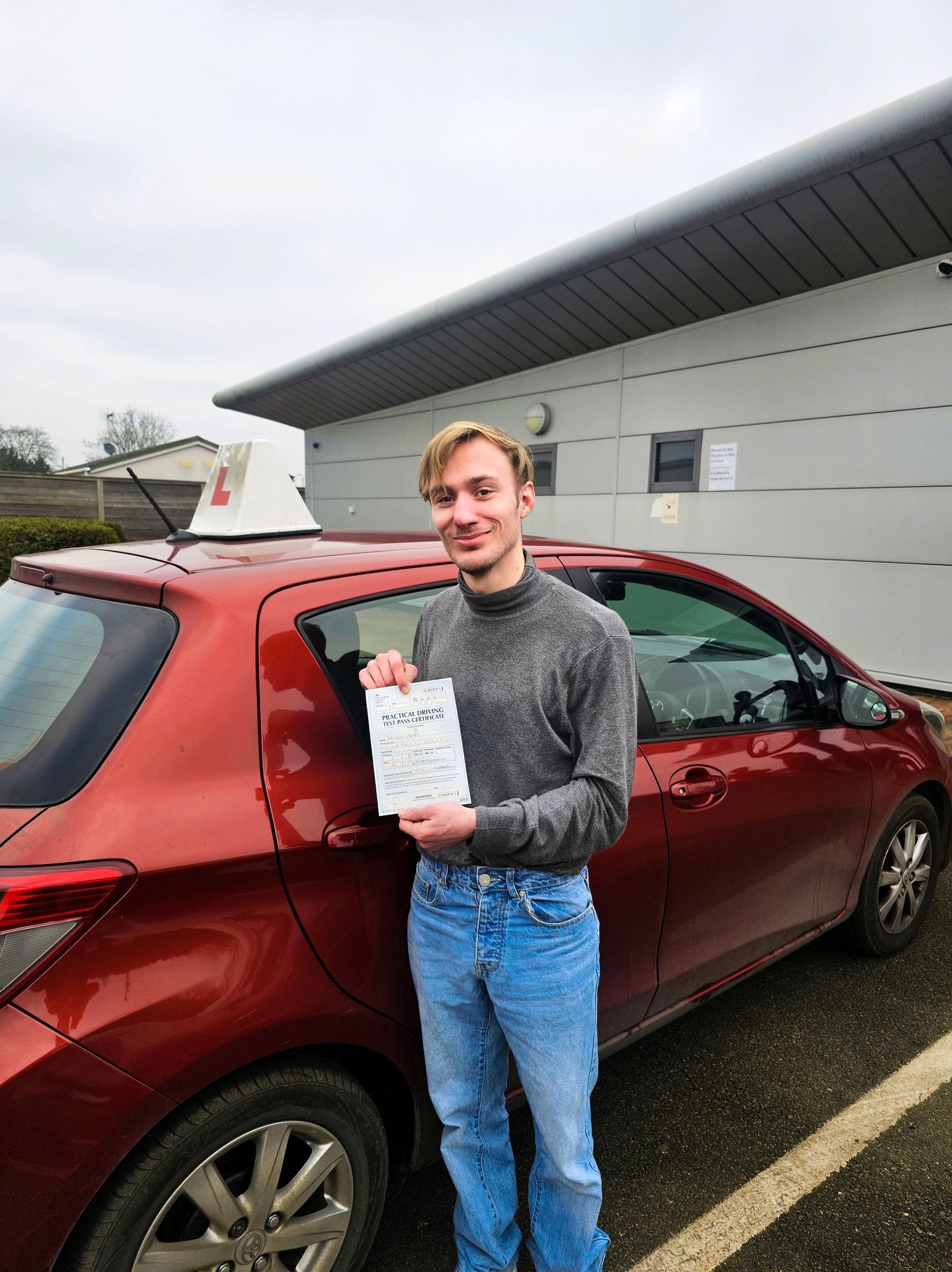 MSA Driving School pupil holding their pass certificate