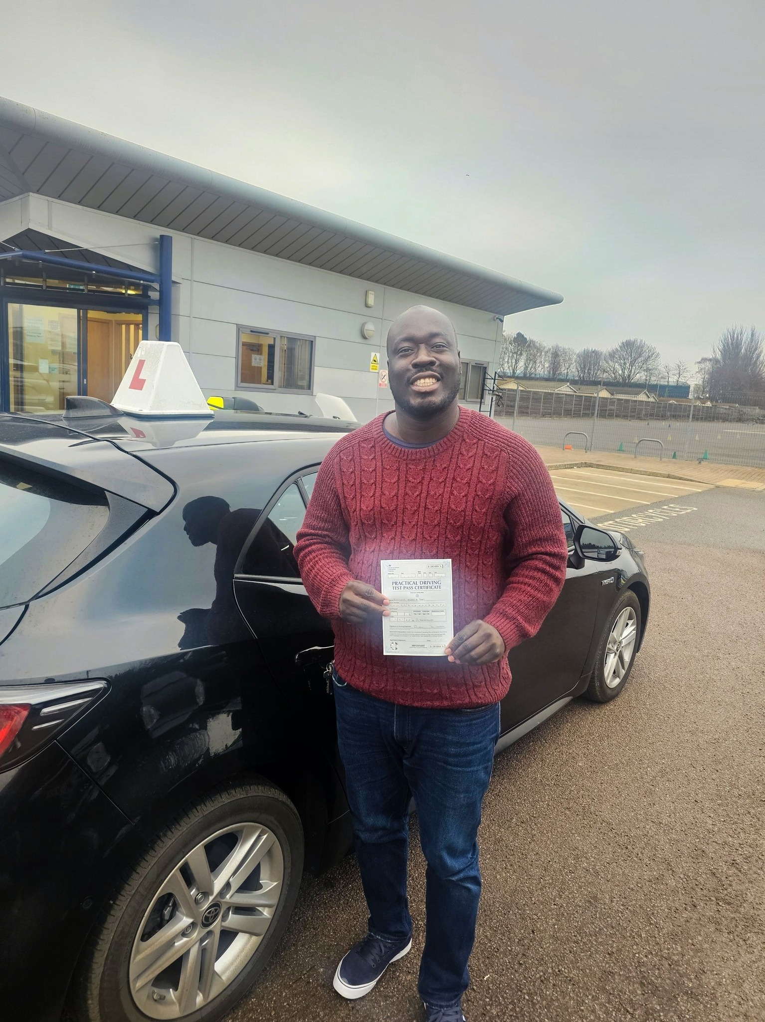 MSA Driving School pupil holding their pass certificate