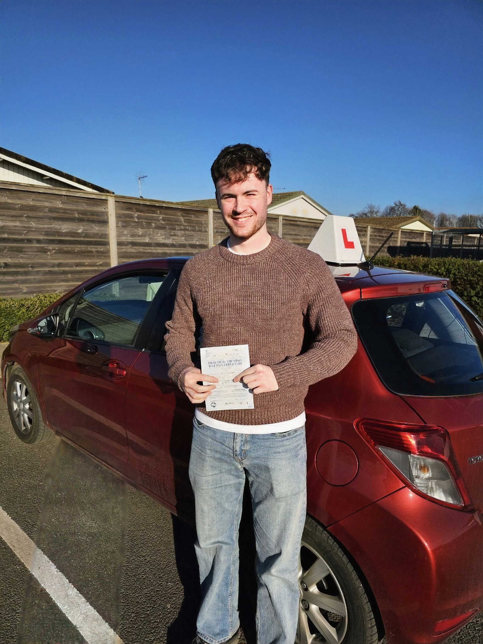 MSA Driving School pupil holding their pass certificate