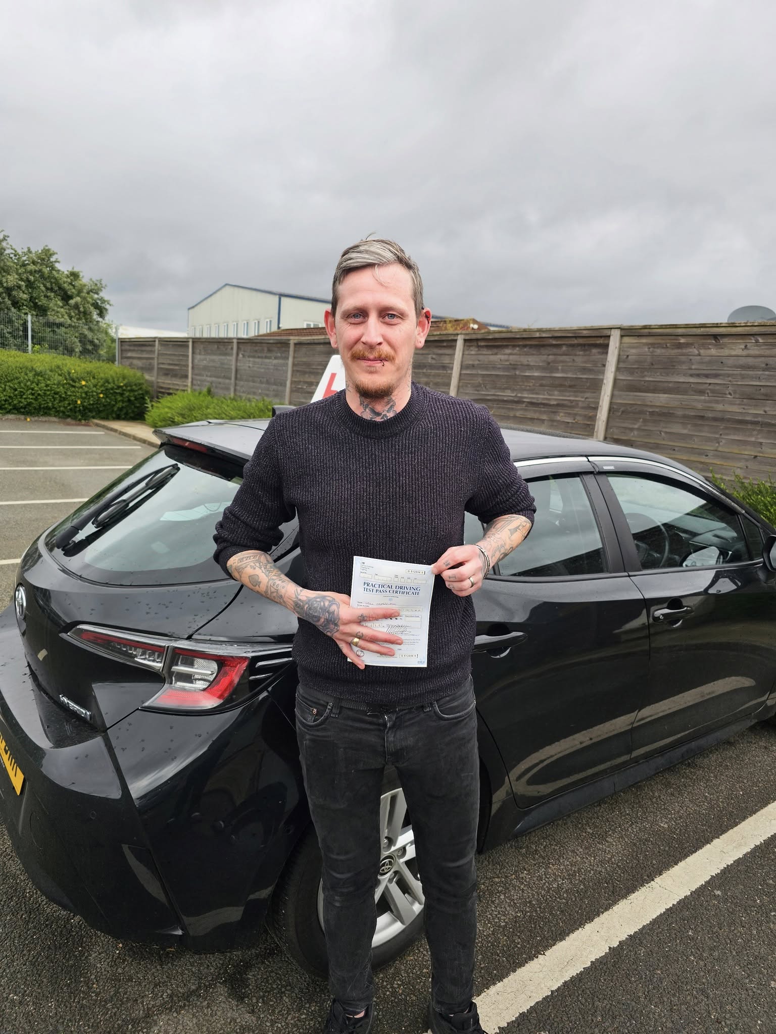 MSA Driving School pupil holding their pass certificate