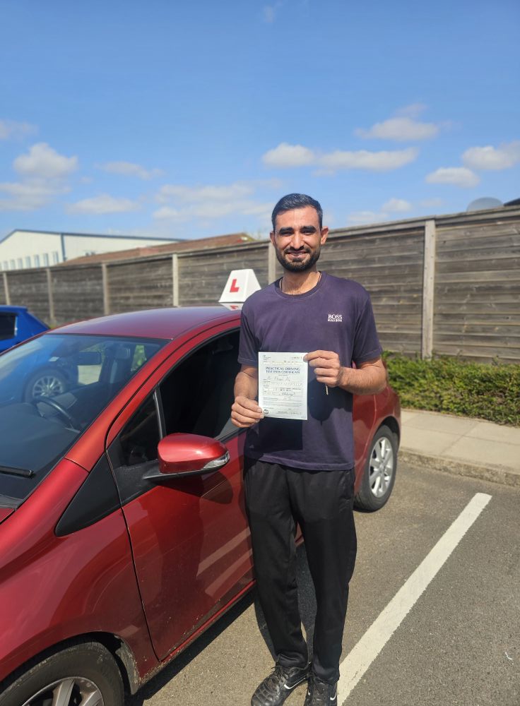MSA Driving School pupil holding their pass certificate