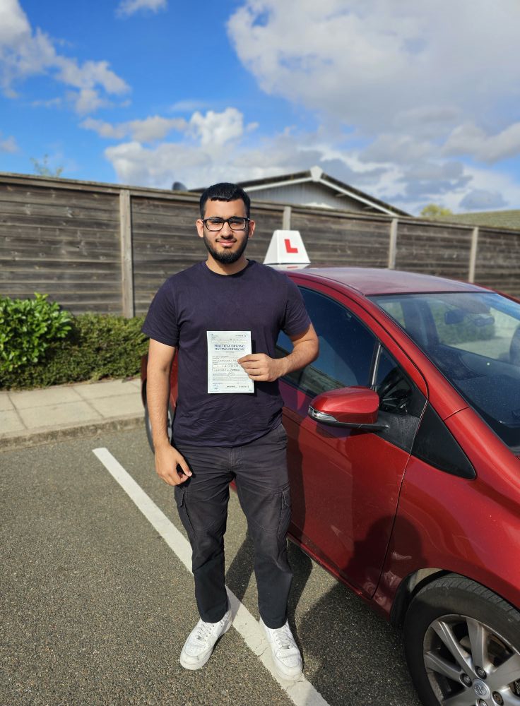 MSA Driving School pupil holding their pass certificate