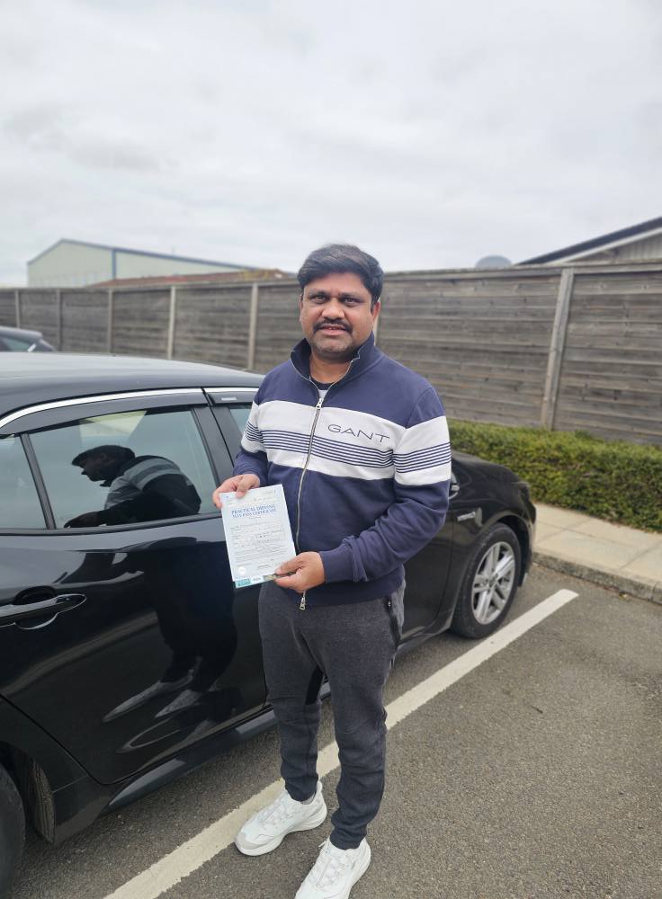 MSA Driving School pupil holding their pass certificate
