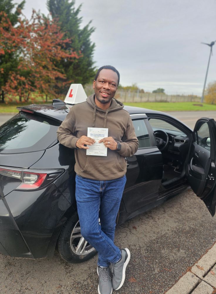 MSA Driving School pupil holding their pass certificate