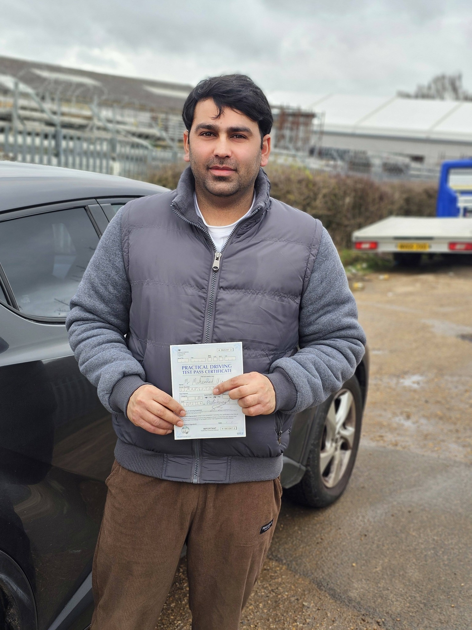 MSA Driving School pupil holding their pass certificate