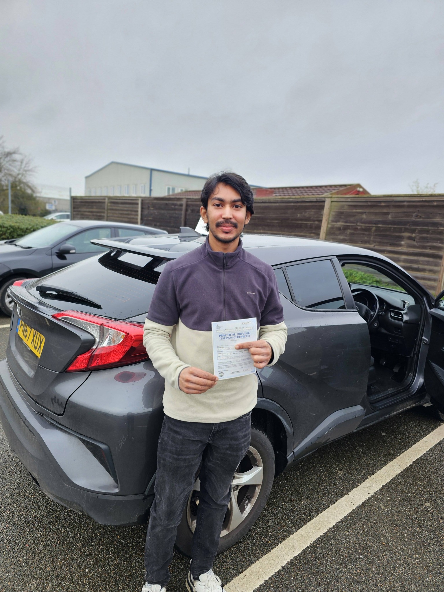 MSA Driving School pupil holding their pass certificate