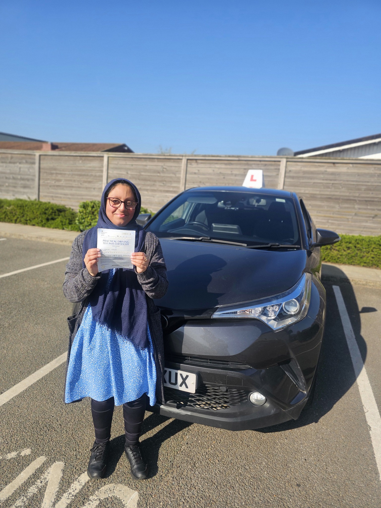 MSA Driving School pupil holding their pass certificate