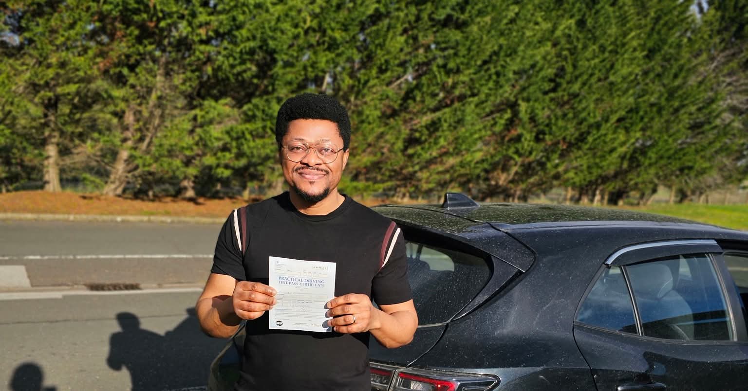 MSA Driving School pupil holding their pass certificate