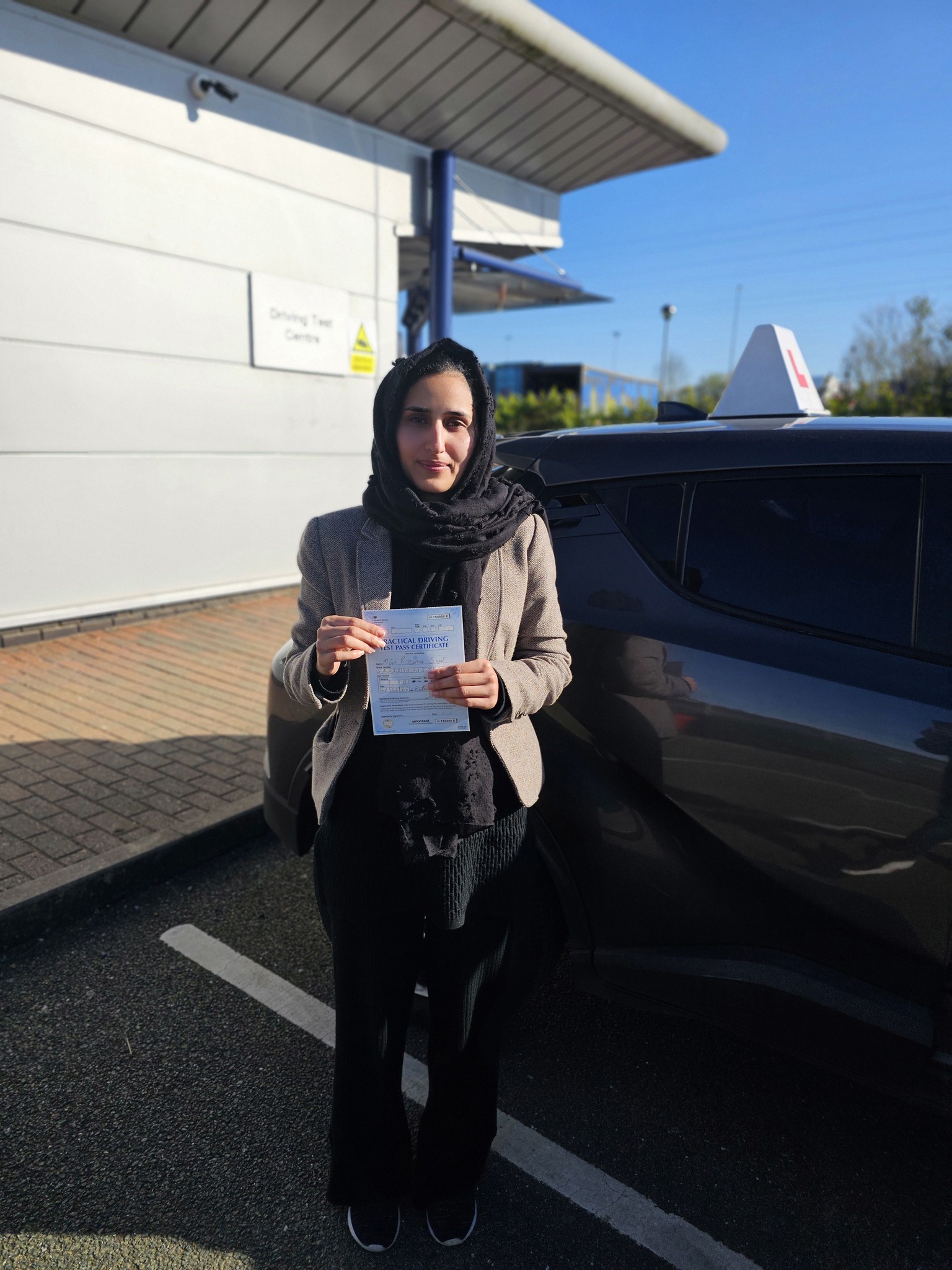 MSA Driving School pupil holding their pass certificate