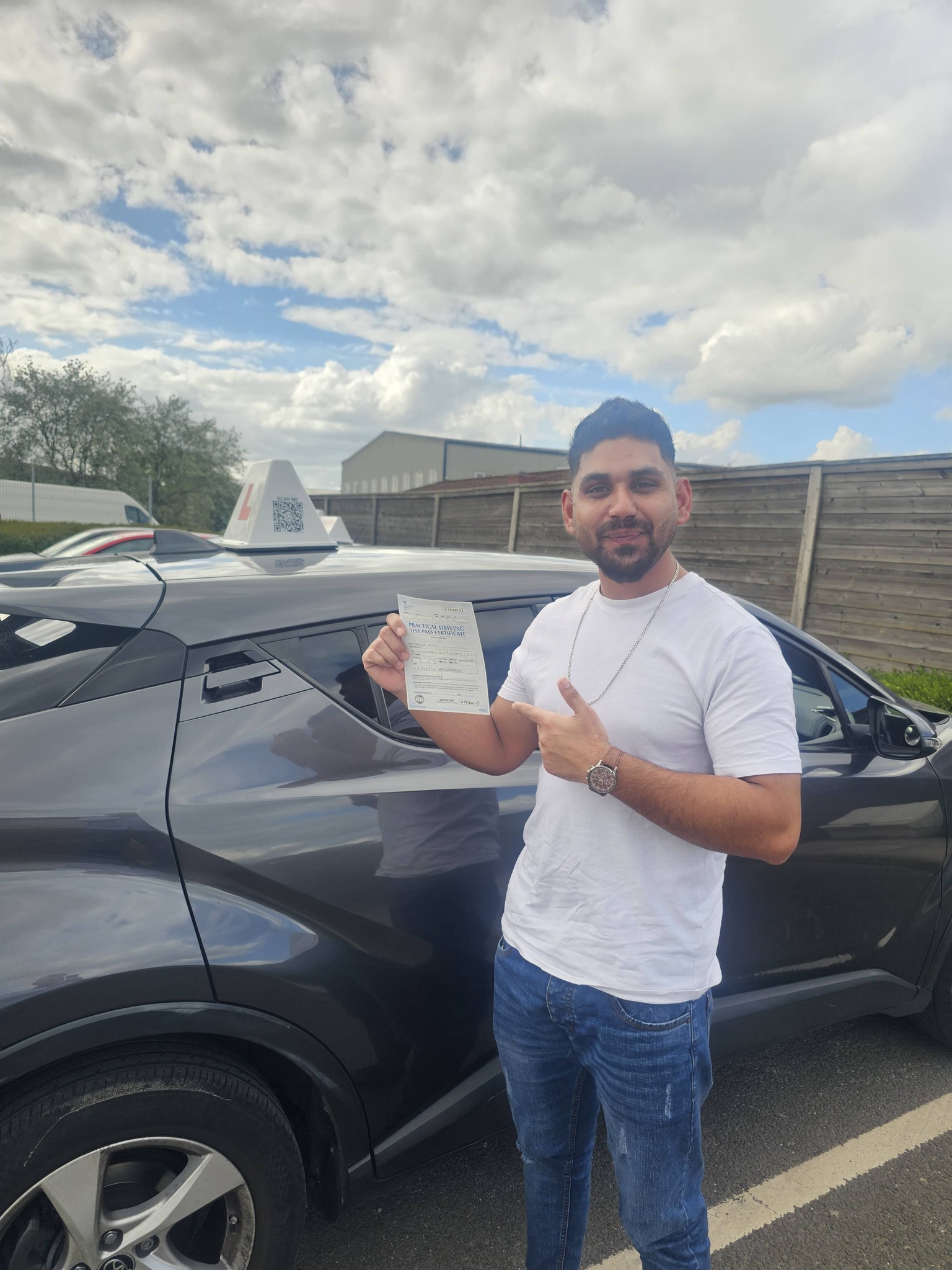 MSA Driving School pupil holding their pass certificate